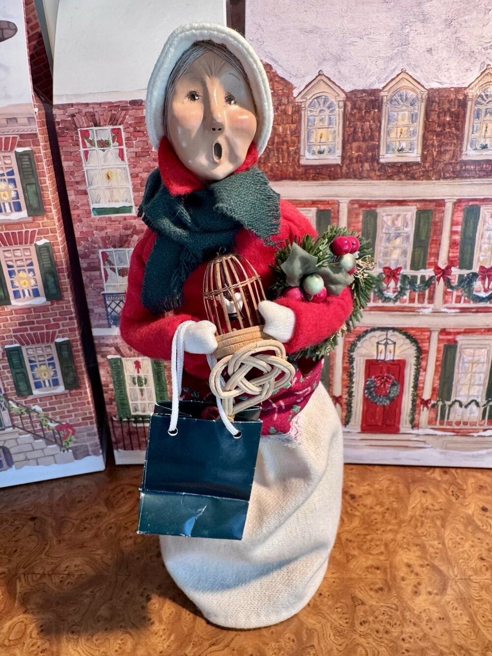 Byers' Choice Caroler 1999 Grandparent Shopper with Gift Bag, Wreath, Bird Cage